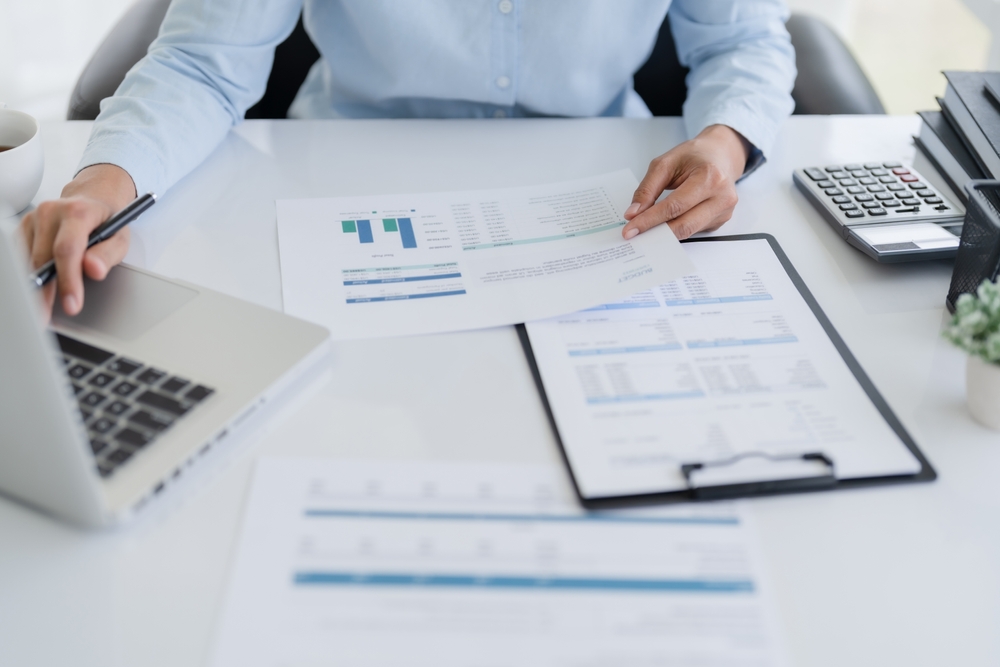 Image Of Woman Calculate Tax,Invoice